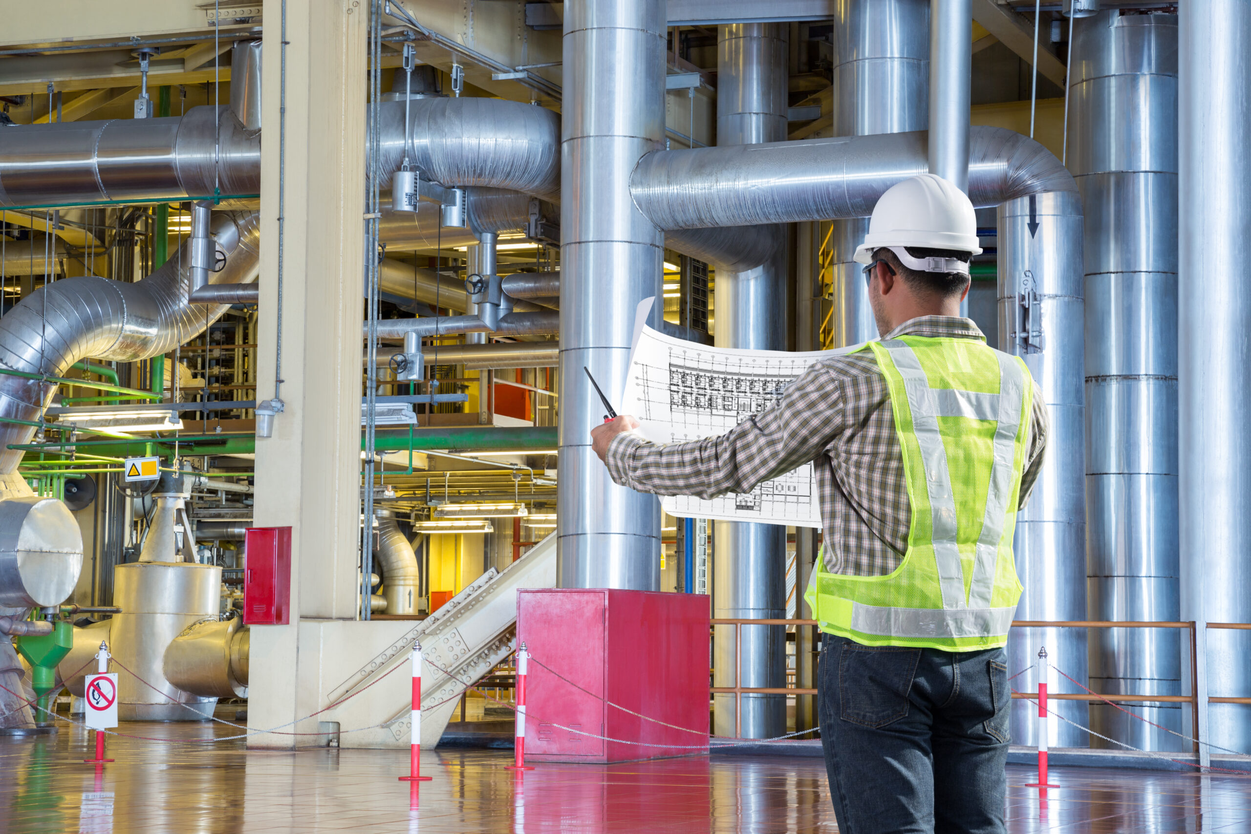 Engineer,Reading,Diagram,For,Maintance,At,Thermal,Power,Plant,Factory
